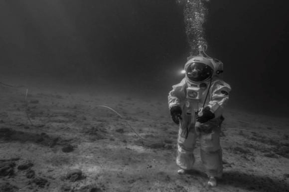 European Space Agency astronaut Jean-François Clervoy recreates the first moon landing mission underwater. Credit: Alexis Rosenfeld