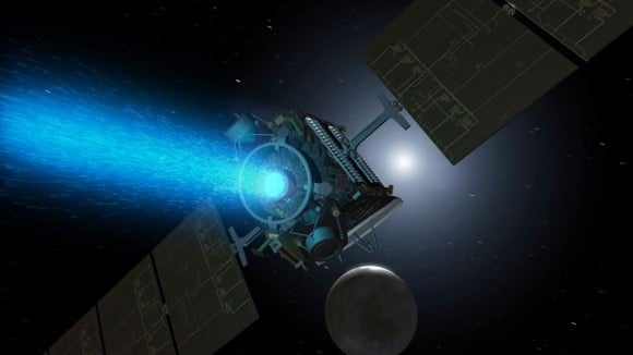 Artist's concept of Dawn above Ceres around the time it was captured into orbit by the dwarf planet in early March. Since its arrival, the spacecraft turned around to point the blue glow of its ion engine in the opposite direction. Image credit: NASA/JPL
