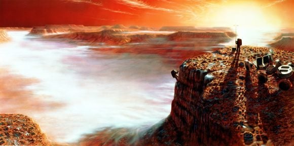 The area depicted is Noctis Labyrinthus in the Valles Marineris system of enormous canyons. The scene is just after sunrise, and on the canyon floor four miles below, early morning clouds can be seen. The frost on the surface will melt very quickly as the Sun climbs higher in the Martian sky. Credit: NASA