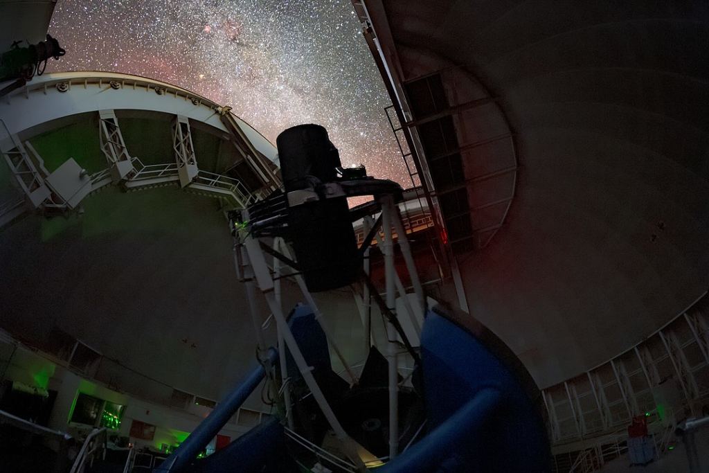 The Dark Energy Spectroscopic Instrument (DESI) sits inside the Mayall Telescope on Kitt Peak near Tuscon, Arizona. Image Credit: By KPNO/NOIRLab/NSF/AURA/T. Slovinský - https://noirlab.edu/public/images/ann22023a/, CC BY 4.0, https://commons.wikimedia.org/w/index.php?curid=127856707