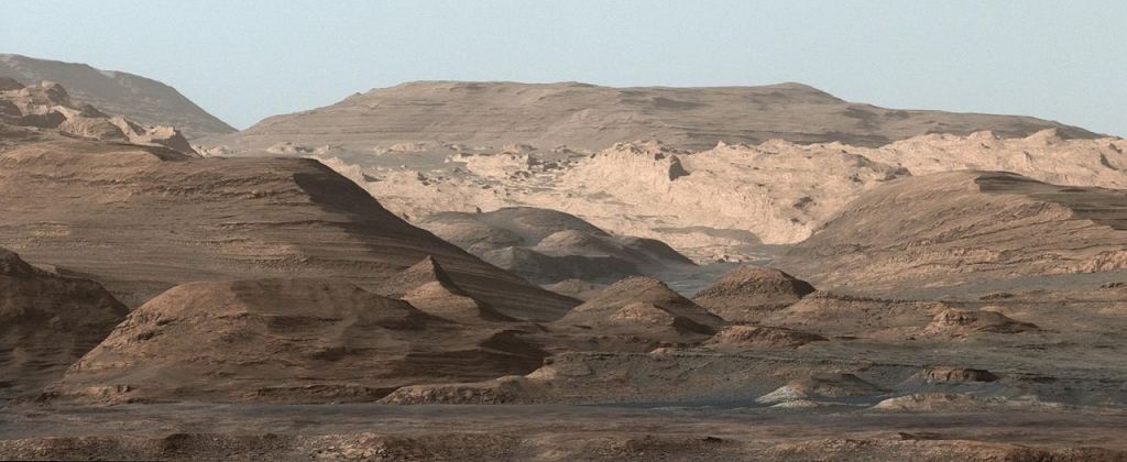 A composite image of Mount Sharp in Gale Crater, created by NASA's Curiosity Rover in 2015. The rover is currently atop a region called Greenheugh Pediment, which is where it snapped the image of the