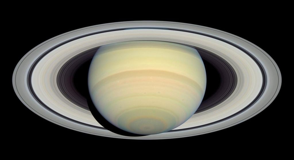 2004 Hubble image of Saturn and its rings. The wide dark gap between the two rings is the Cassini Division. The outer large ring is the A ring and the inner large ring is the B ring. Image Credit: By NASA, ESA and E. Karkoschka (University of Arizona) - http://hubblesite.org/newscenter/archive/releases/2004/18/image/a/ (direct link), Public Domain, https://commons.wikimedia.org/w/index.php?curid=3111498