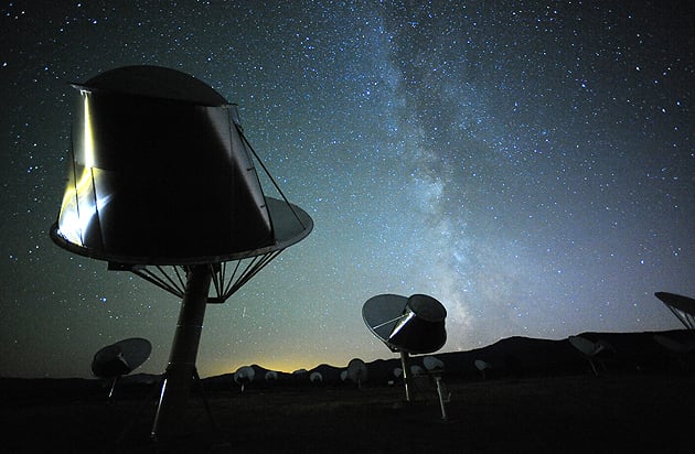 The Search for Extraterrestrial Intelligence (SETI) listens for radio signals from other civilizations. In this image, radio telescopes in SETI's Allen Telescope Array (ATA) are hard at work with the Milky Way in the background. Image: SETI