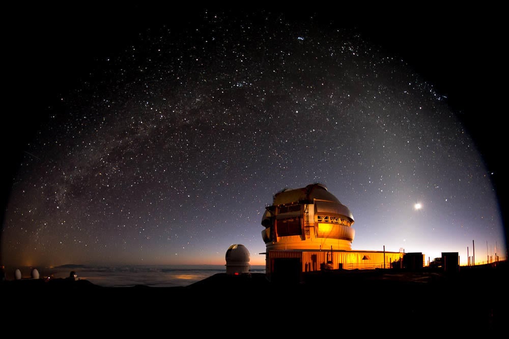 One of the Gemini Observatory's 8.1 meter telescopes, with the Milky Way arching overhead. Image Credit: Gemini Observatory/AURA image by Joy Pollard