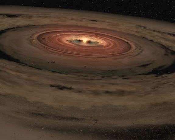 Artist's conception of early planetary formation from gas and dust around a young star. Planets with large abundances of volatile elements (such as hydrogen) need cooler environments much further from their stars in order to maintain their volatiles. So-called