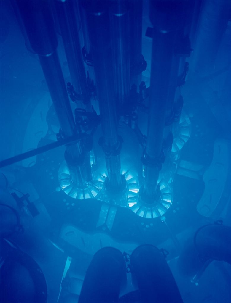 The tell-tale blue glow of Cherenkov radiation from the Advanced Test Reactor in Idaho. Image Credit: By Argonne National Laboratory - originally posted to Flickr as Advanced Test Reactor core, Idaho National LaboratoryUploaded using F2ComButton, CC BY-SA 2.0, https://commons.wikimedia.org/w/index.php?curid=27024528