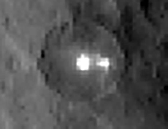 Tight crop of the two bright spots. Could they be ice? Volcano-related? Credit: NASA/JPL-Caltech/UCLA/MPS/DLR/IDA