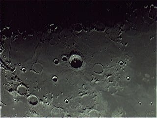 The scarred and battered face our Moon. (Photo by author).