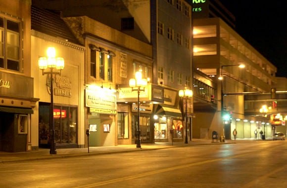 Example showing poorly shielded light fixtures. With nothing to contain or direct the light, it shines where it's not needed - straight up! Credit: Bob King