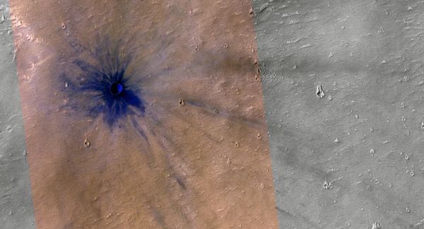 Another view of the crater that struck Mars sometime between February and July, 2005. Image Credit: NASA/JPL/UoArizona
