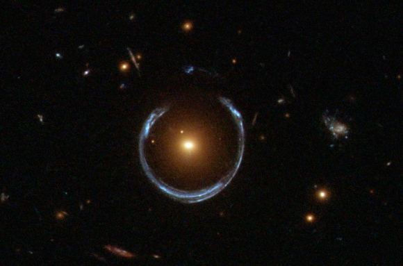 An almost perfect Einstein Ring as seen by Hubble Space Telescope. The background galaxy and foreground lensing galaxy are in an almost exact line with each other.