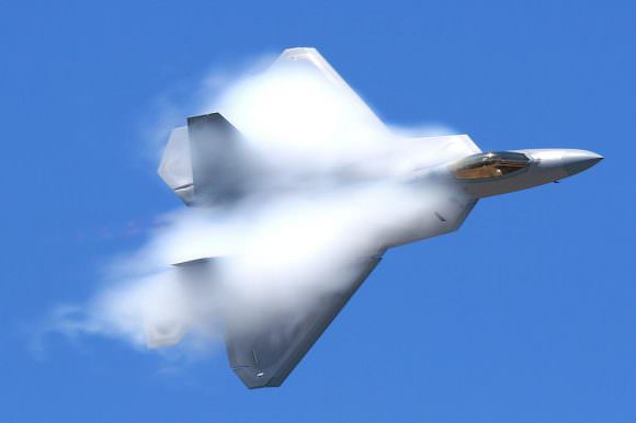 An F-22 Raptor reaching a velocity high enough to achieve a sonic boom. Credit: strangesounds.org