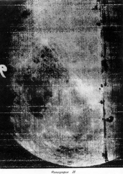 Telephoto view of the far side with Mare Smythii (Sea of Smyth) at left and bright crater Giordano Bruno at center. Credit: Roscosmos