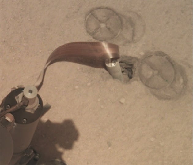 This image shows that the mole has accidentally created a hole about twice its own size. This prevents the necessary friction between the mole and sides of the hole. Image Credit: NASA/JPL-CalTech