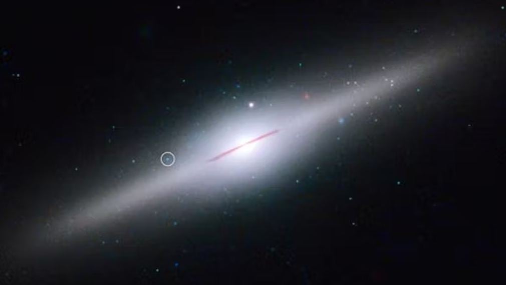 This image shows the IMBH candidate HLX-1, about 290 million miles away. Image Credit: Sean Farrell.