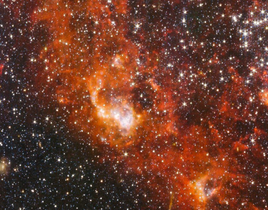 This zoomed-in region of the JWST's full-size NGC 5068 image shows one of the gas clouds lit up by hot young stars within. Image Credit: ESA/Webb, NASA & CSA, J. Lee and the PHANGS-JWST Team