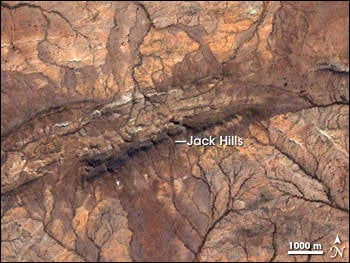 Earth's most ancient rock holds our best geologic clues about Earth's early life, but they're not easy to find and untangle. This is Australia's Jack Hills formation, where ancient zircons hold important clues about the history of life. By Robert Simmon, NASA - http://earthobservatory.nasa.gov/Study/Zircon/, Public Domain, https://commons.wikimedia.org/w/index.php?curid=4258701