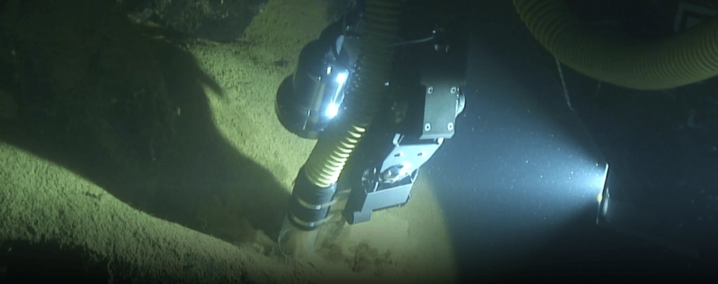 Nereid Under Ice collecting a sample with its sucker hose. Image Credit: Woods Hole Oceanographic Institute.