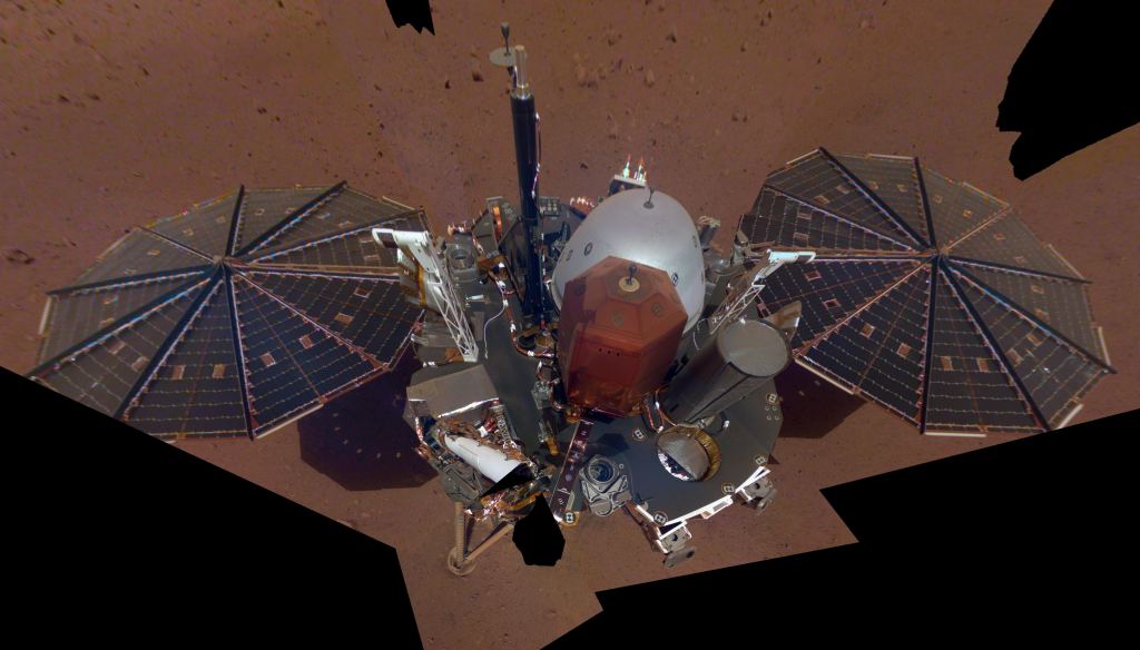InSight's first full selfie on Mars. The selfie was taken on Dec. 6th, and is a mosaic of 11 images taken with its Instrument Deployment Camera on the elbow of its robotic arm. Image Credit: NASA/JPL-Caltech