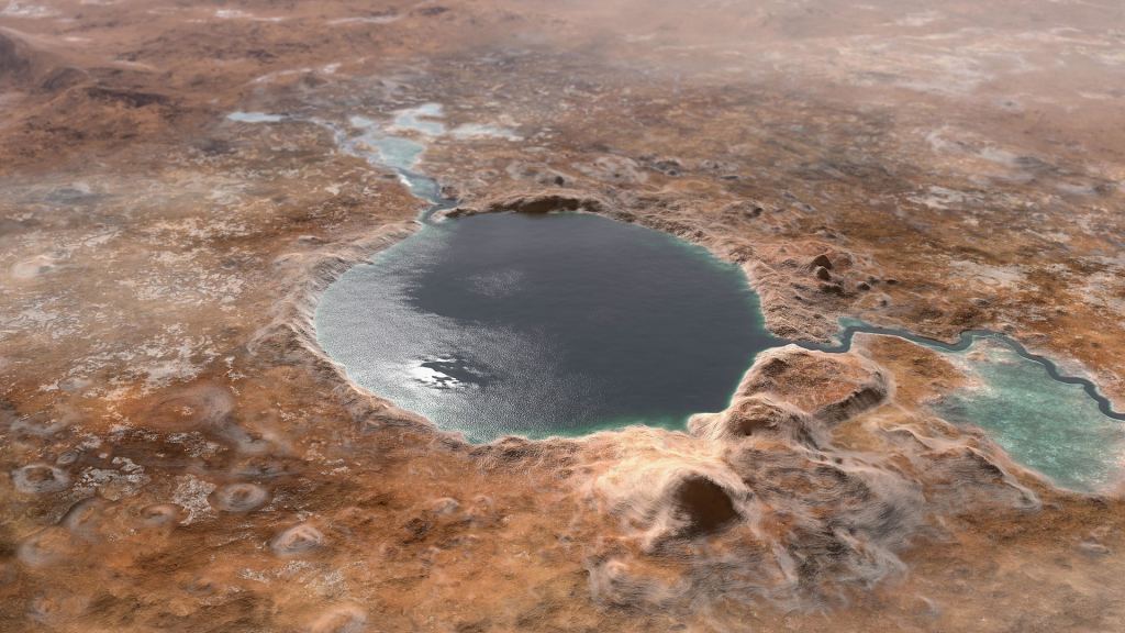 This illustration shows Jezero Crater — the landing site of the Mars 2020 Perseverance rover — as it may have looked billions of years go on Mars, when it was a lake. An inlet and outlet are also visible on either side of the lake. This region is now dry, but Perseverance and Ingenuity are exploring its geology and for possibilities of ancient life signs. Courtesy NASA.
