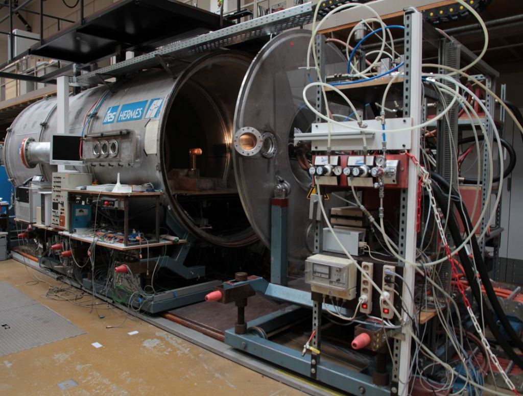 This is the PWK1 Plasma Wind Tunnel at Stuttgart University in Germany. It's the only facility in the world with the required hydrogen capabilities to study the interaction of pyrolysis and ablation on a spacecraft's thermal protection system. Image Credit: ESA