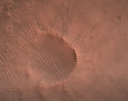 This is one of the small craters inside Jezero Crater that drifted into and out of view of the landing camera. Image Credit: NASA/JPL/Caltech.