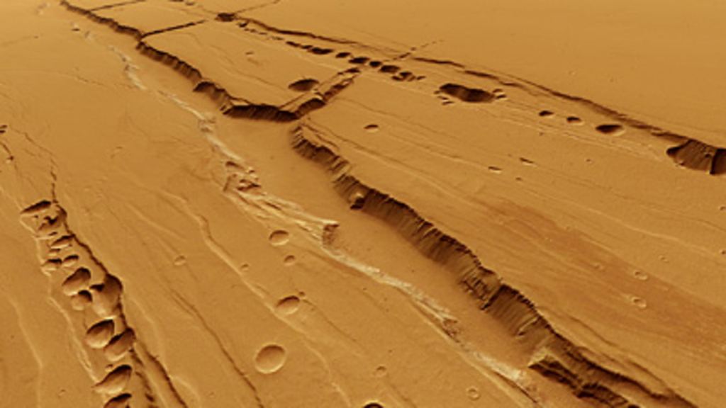 Pit Chains in Tharsis. Credit: ESA/DLR/FU Berlin (G. Neukum)