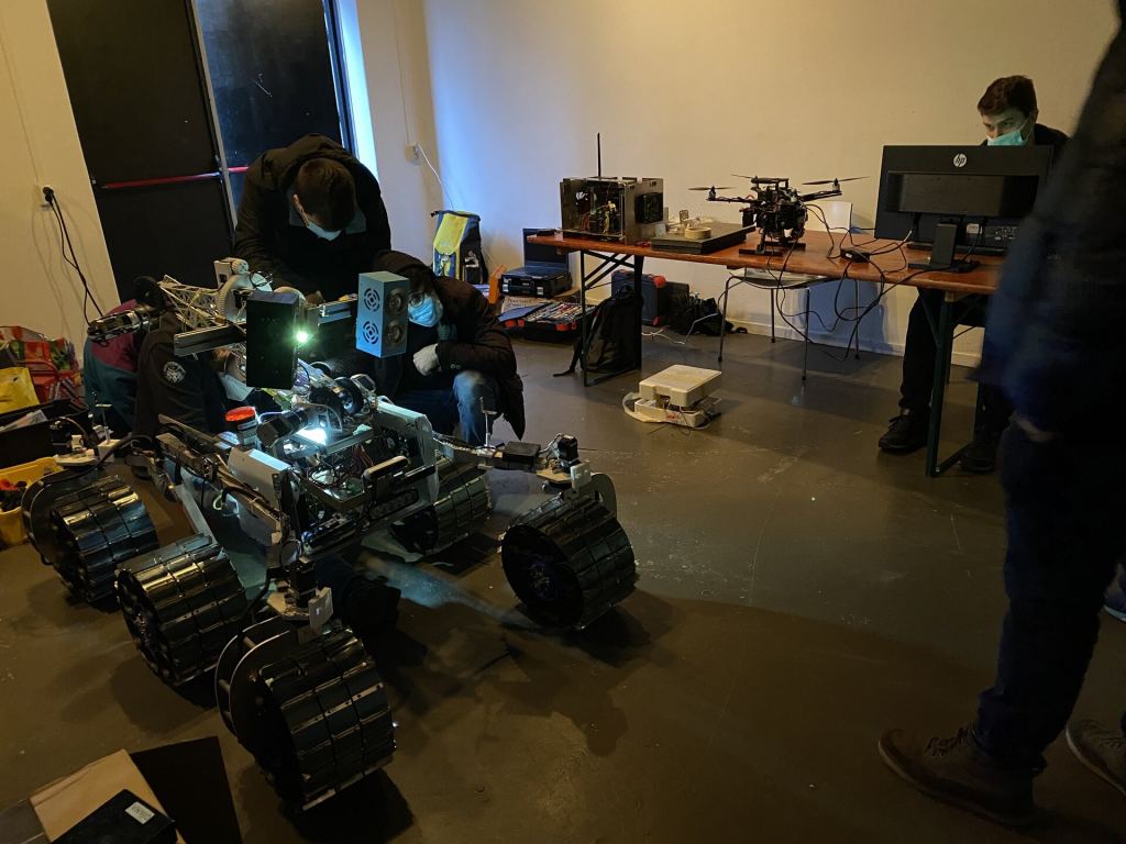The University of Turin team prepares their rover for the inaugural ESA-ESRIC Space Resources Challenge. Image Credit: ESA-M. Sabbatini