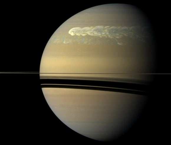 The huge storm churning through the atmosphere in Saturn's northern hemisphere overtakes itself as it encircles the planet in this true-color view from NASA’s Cassini spacecraft. Image credit: NASA/JPL-Caltech/SSI