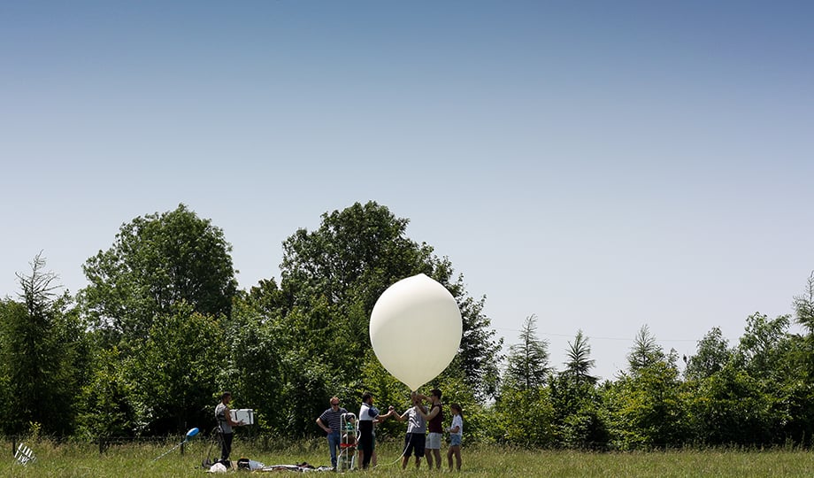 The team launching the payload from a field near Bath. Image: Omar Gad