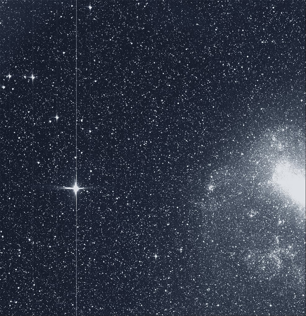 This is TESS's First Light image. On the left is the star R Doradus, and on the right is the Large Magellanic Cloud. Image: By NASA/MIT/TESS