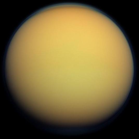 This true-color image of Titan, taken by the Cassini spacecraft, shows the moon's thick, hazy atmosphere. Image: By NASA - http://photojournal.jpl.nasa.gov/catalog/PIA14602, Public Domain, https://commons.wikimedia.org/w/index.php?curid=44822294