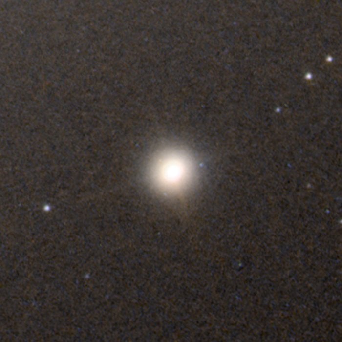 The Ultra Compact Dwarf Galaxy M60-UCD1 is not ancient and is only about 50 million light years away. But it's similar to the ancient dwarf galaxies found by the JWST. It's only about 1/500th the diameter of the Milky Way, yet is densely packed with stars and extremely luminous. (Image Credit NASA/ESA and A.Seth)