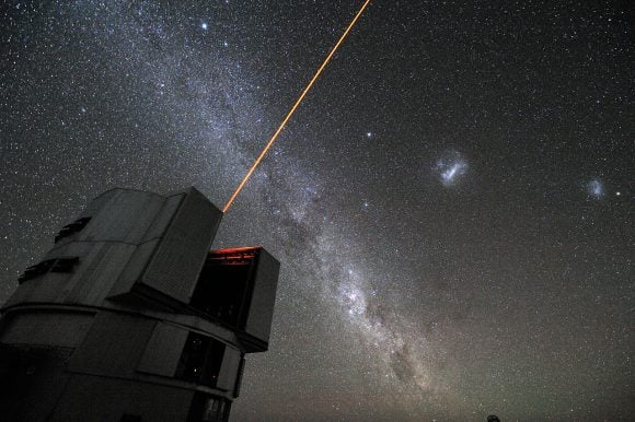 The Very Large Telescoping Interferometer firing it's adaptive optics laser. Credit: ESO/G. Hüdepohl