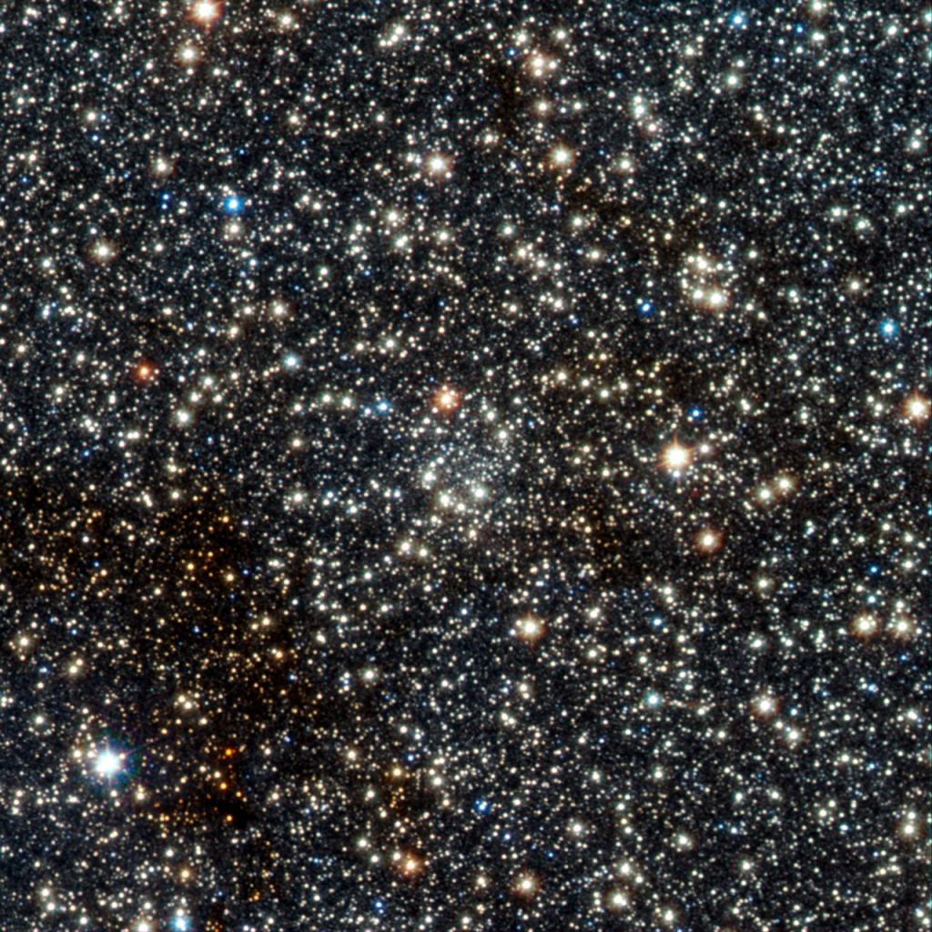 This image from VISTA shows the faint newly found globular star cluster VVV CL002. This globular, which appears as an inconspicuous concentration of faint stars near the centre of the picture, lies close to the centre of the Milky Way and is moving closer to the centre. The region is crowded with stars. Image Credit: ESO/D. Minniti/VVV Team