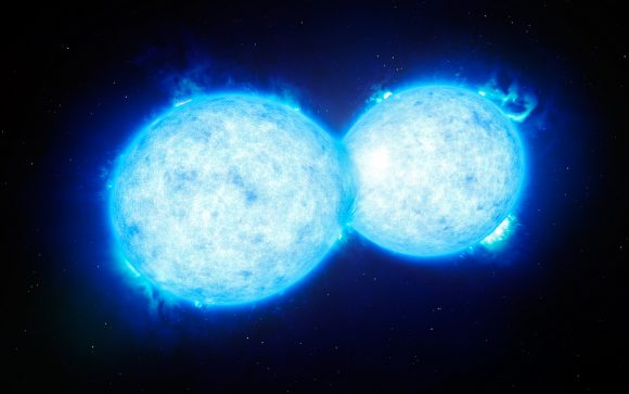 This artist’s impression shows VFTS 352 — the hottest and most massive double star system to date where the two components are in contact and sharing material. The two stars in this extreme system lie about 160 000 light-years from Earth in the Large Magellanic Cloud. This intriguing system could be heading for a dramatic end, either with the formation of a single giant star or as a future binary black hole. ESO/L. Calçada