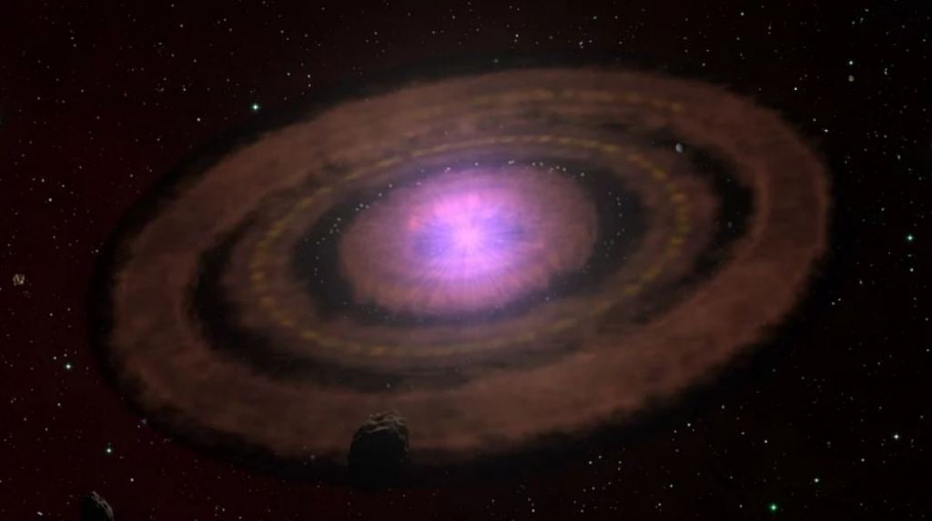 This artistic impression illustrates what planet-forming disks around young stars often look like. They initially consist of dust and gas configured into rings of dense material. In time, the solid components grow into pebbles which eventually can evolve into planets. Since the ALMA observations used in this study are only sensitive to millimetre-sized dust grains, evolved disks with larger objects or even planets produce a relatively faint signal from the remnant material. The new results indicate that without external irradiation, such disks evolve similarly. After about a million years, most of them do not have enough mass to produce large planets like Jupiter. However, such planets may already have formed there.
Image Credit: MPIA graphics department