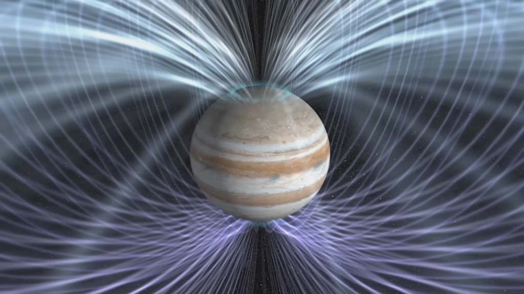 Jupiter has an extremely powerful magnetic field. Ganymede has one, too, and is the only moon with one. Jupiter's envelops Ganymede's and their interactions are just part of the pair's complicated relationship. Image Credit: NASA Goddard Space Flight Center.