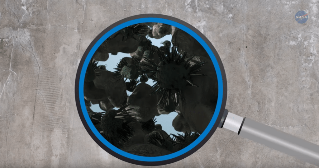 An artist's illustration of the microcrystals that form in concrete as it hardens. Image Credit: NASA.