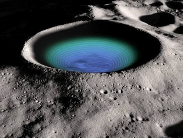 This shaded relief image shows the Moon's Shackleton Crater, a 21-km-wide crater permanently shadowed crater near the lunar south pole. The crater's interior structure is shown in false colour based on data from NASA's LRO probe. Like other craters in the region, Shackleton's floor is in perpetual darkness, and the temperature is extremely low. Image Credit: NASA