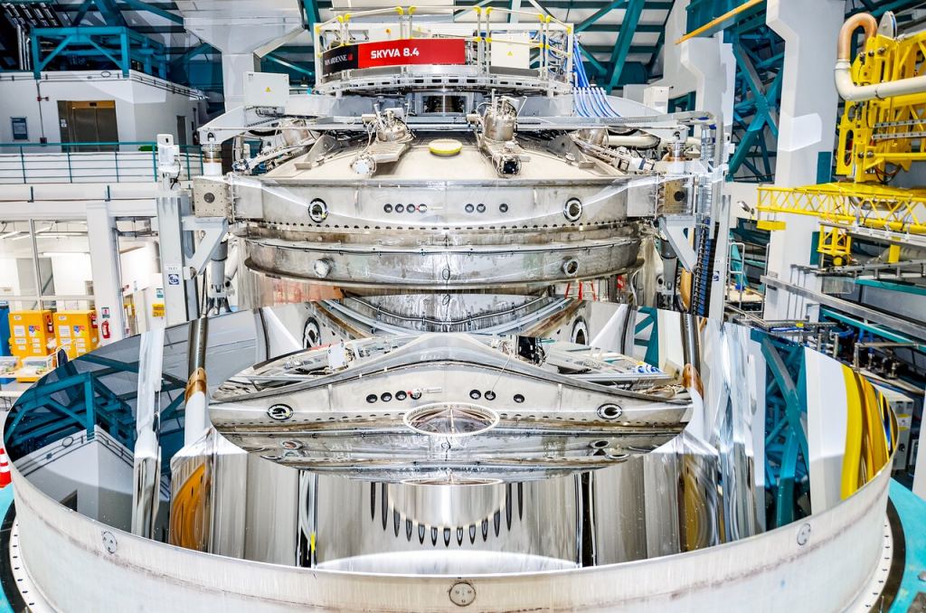 This image shows the Rubin Observatory's 8.4-meter combined primary/tertiary mirror after being coated with protected silver in April 2024. The reflective coating was applied using the observatory's onsite coating chamber, which will also be used to re-coat the mirror as necessary during Rubin's 10-year Legacy Survey of Space and Time. Image Credit: RubinObs/NOIRLab/NSF/AURA