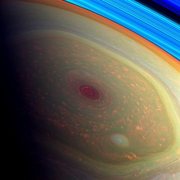 A false-color view of Saturn's storm, as seen through Cassini's wide-angle camera. The blue bands at the edge are Saturn's rings. Credit: NASA/JPL-Caltech/SSI