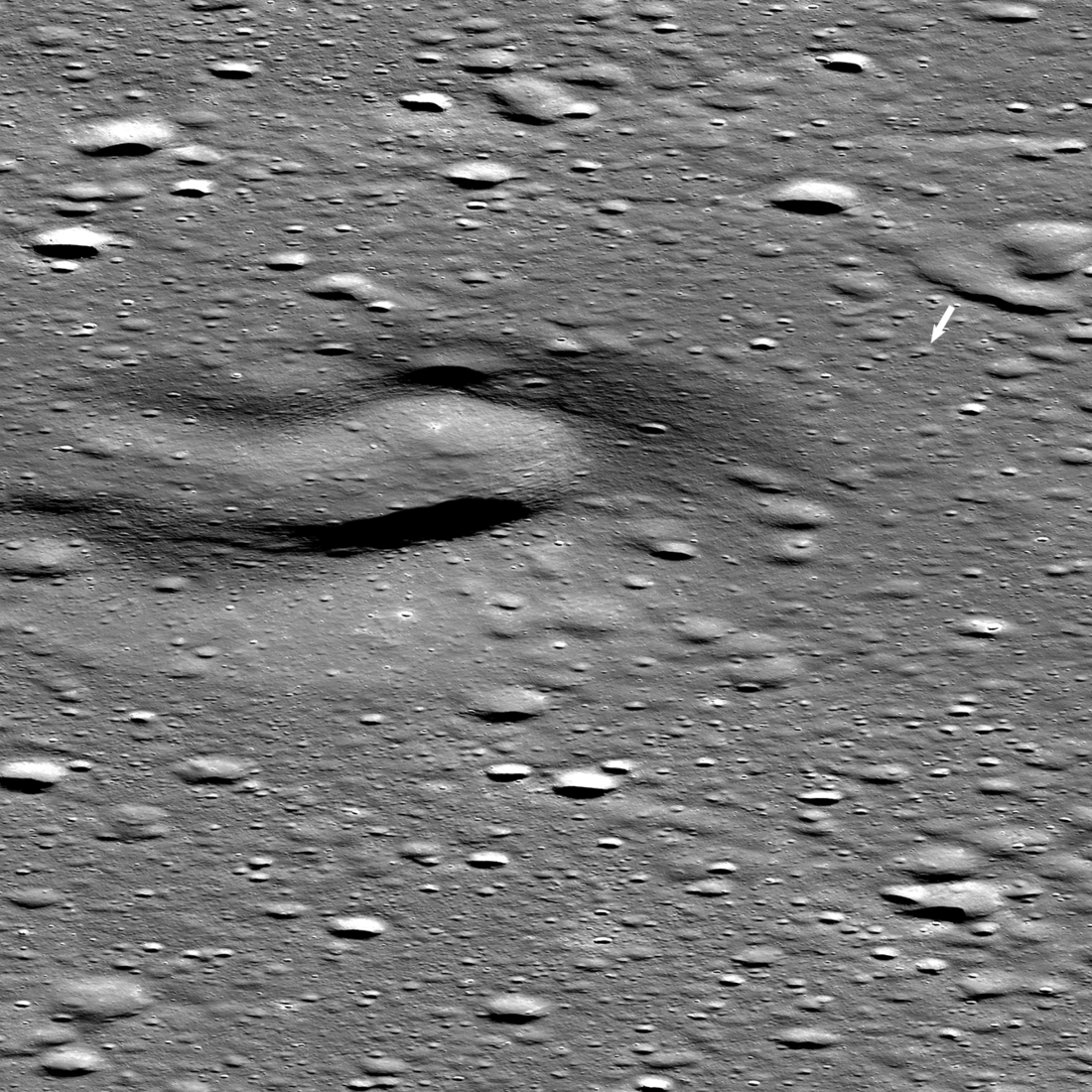 The Firefly Blue Ghost lunar lander set down on 2nd March 2025. The landing site (arrow) is about 4000 meters from the center of Mons Latreille, a large volcanic cone. NAC M1495577008LR [NASA/GSFC/Arizona State University].