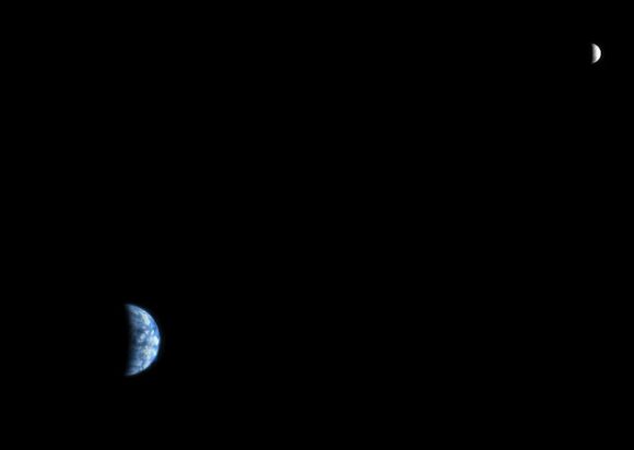 Mars Reconnaissance Orbiter's High Resolution Imaging Science Experiment (HiRISE) camera can also be used to view other planets. MRO took this image of the Earth and the Moon on 3 October 2007. Credit: NASA/JPL