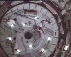 'Running the lockers' inside Skylab. (NASA)
