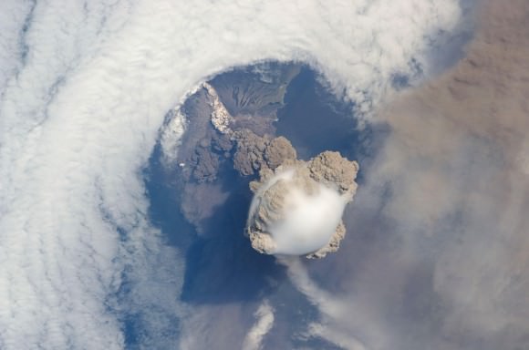 Sarychev volcano, (located in Russia's Kuril Islands, northeast of Japan) in an early stage of eruption on June 12, 2009. Credit: NASA