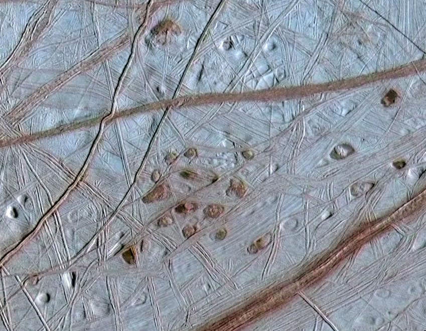 Image of Europa's ice shell, taken by the Galileo spacecraft, of fractured "chaos terrain." In this terrain, cracks, ridges, and plains are all jumbled together. Scientists think that this terrain allows surface oxygen to penetrate the ice and make its way into the subsurface ocean. Image Credit: NASA/JPL-Caltech