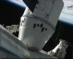 Station Astronauts Enter the Dragon - First Private Capsule at ISS ...