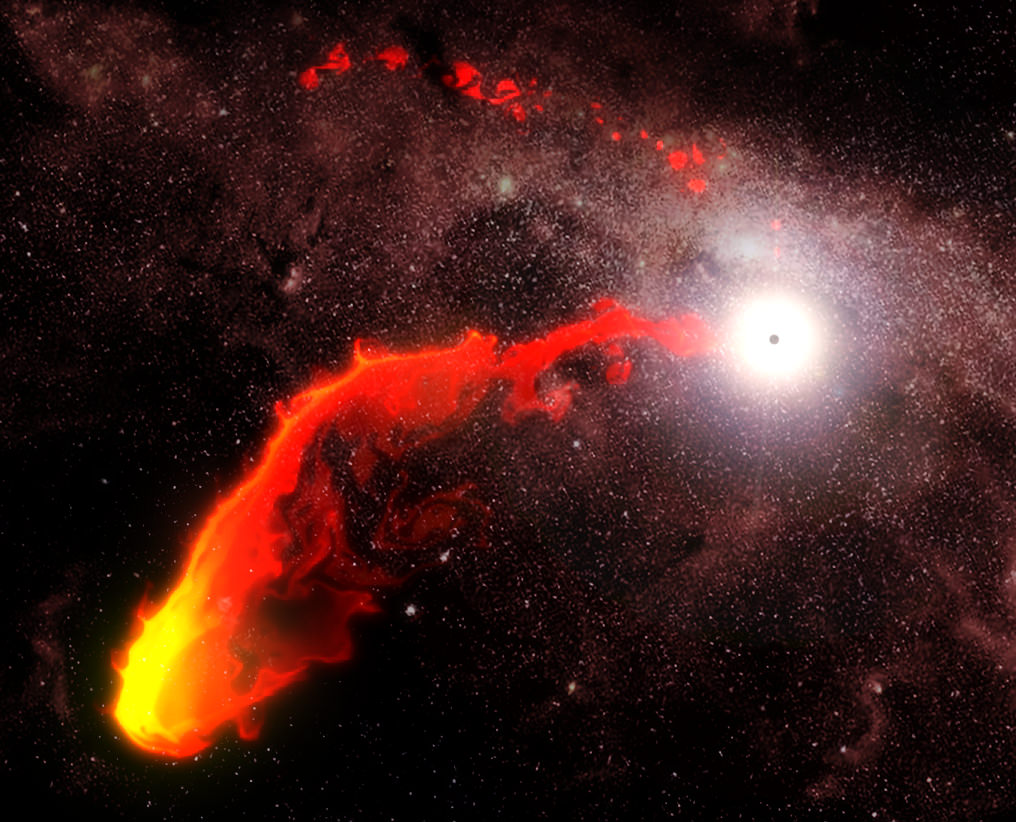 Illustration of gas cloud G2 approaching Sgr A* . Our central supermassive black hole periodically snacks on clouds and other material like this. That gives off X-rays and other emissions. (ESO/MPE/M.Schartmann/J.Major)