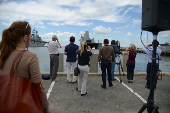 Social media and media including Ken observe the Aug. 15 Orion water recovery test from the pier at Naval Station Norfolk, VA.  Credit: NASA